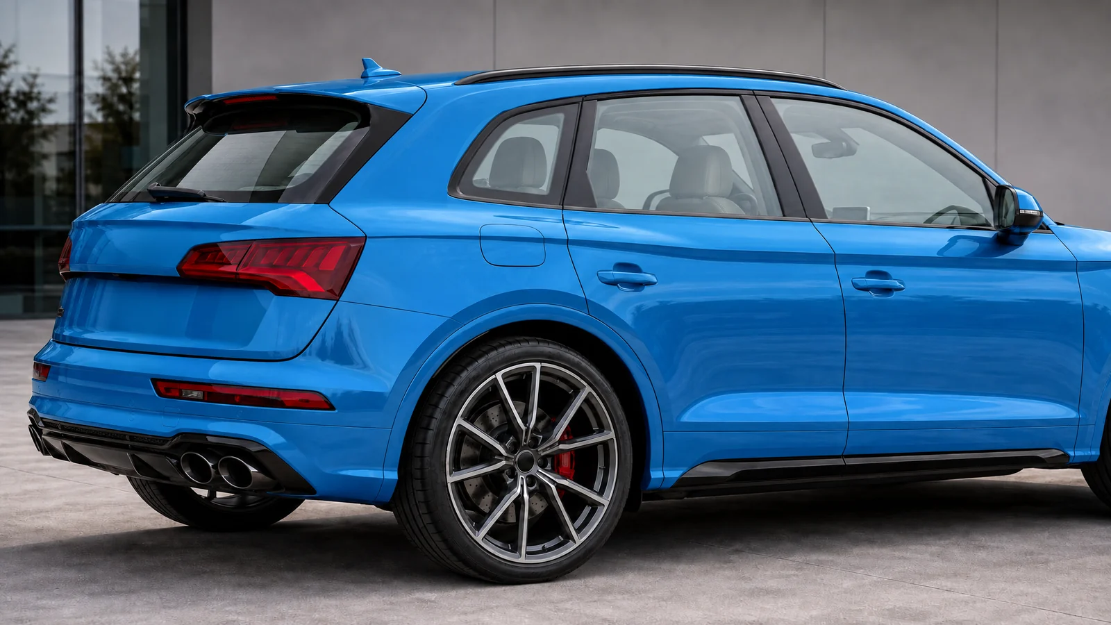 An Audi SQ5 showing Union window tint shades on its side and rear glass