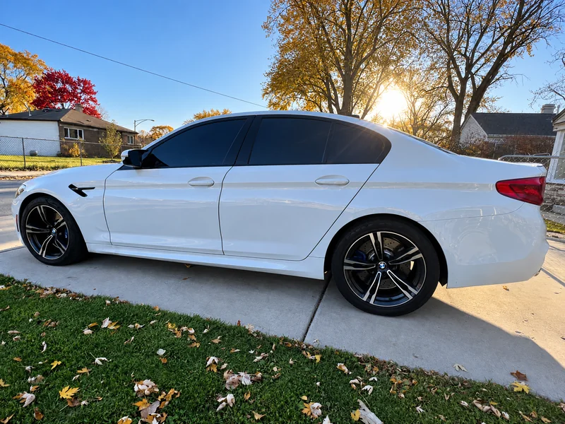 A white BMW sedan tinted by Beast Auto Tints