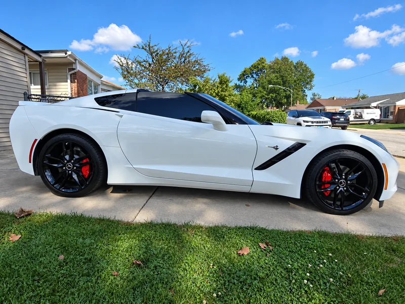 A white Chevrolet Corvette tinted by Beast Auto Tints