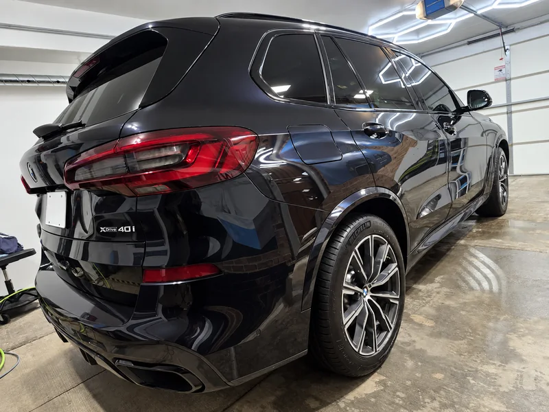 A black BMW X5 tinted by Beast Auto Tints