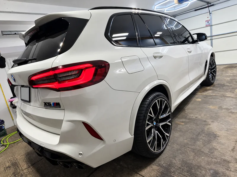 A white BMW X5 tinted by Beast Auto Tints
