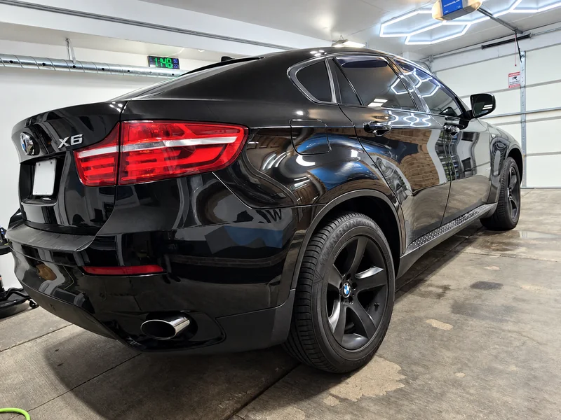 A black BMW X6 tinted by Beast Auto Tints