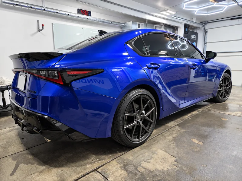 A blue Lexus IS tinted by Beast Auto Tints