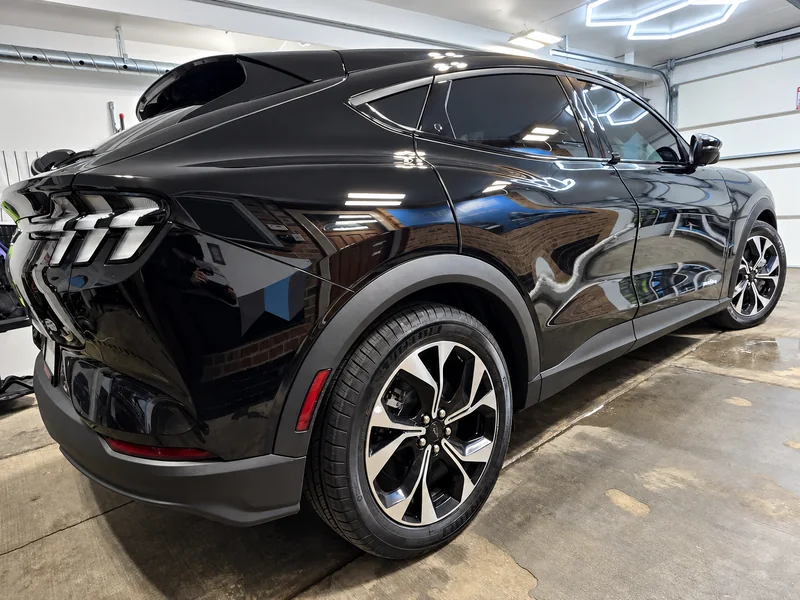 A black Ford Mustang Mach-E tinted by Beast Auto Tints