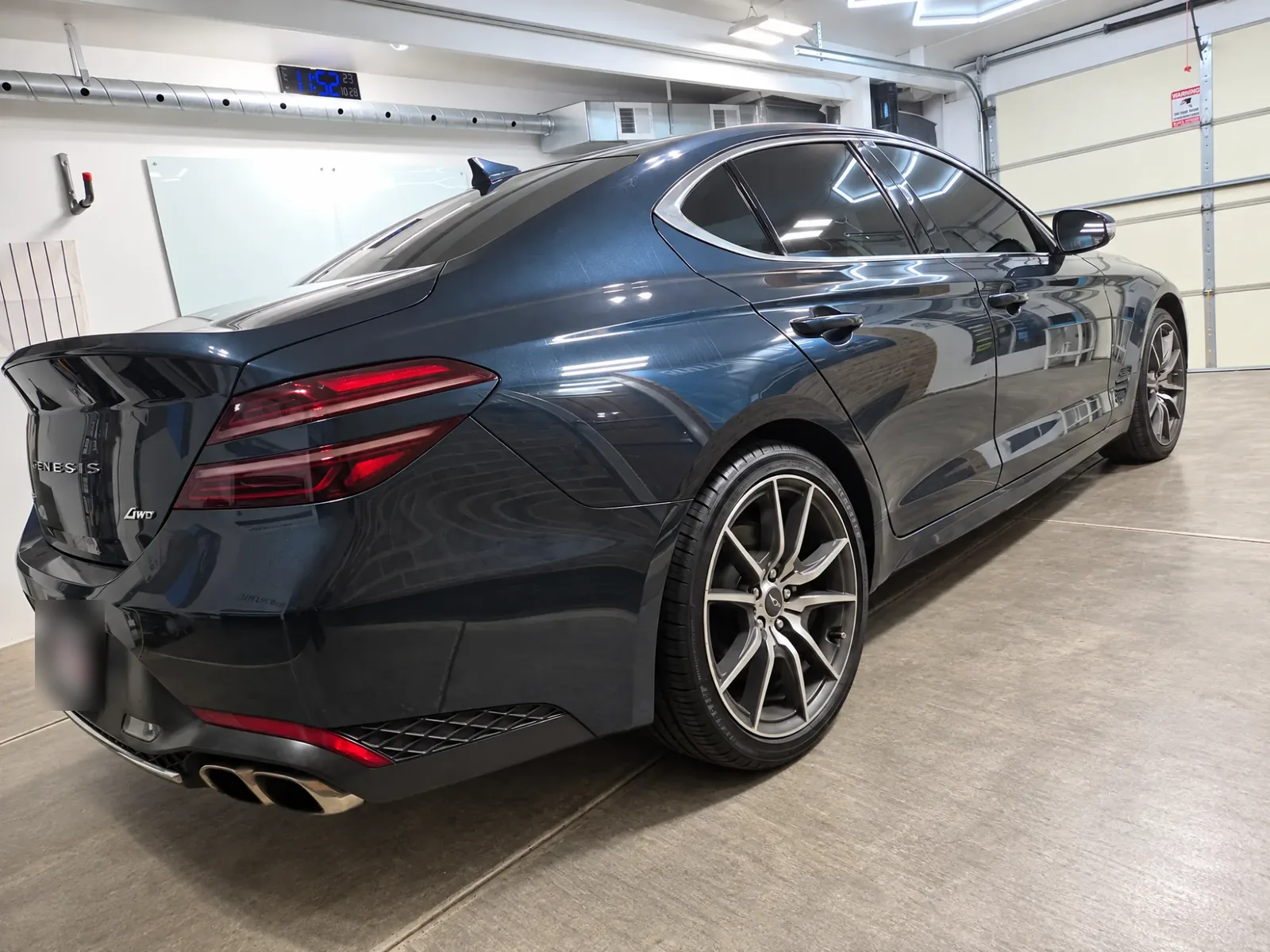 Dark gray Genesis G70 with tinted windows, tinted by Beast Auto Tints