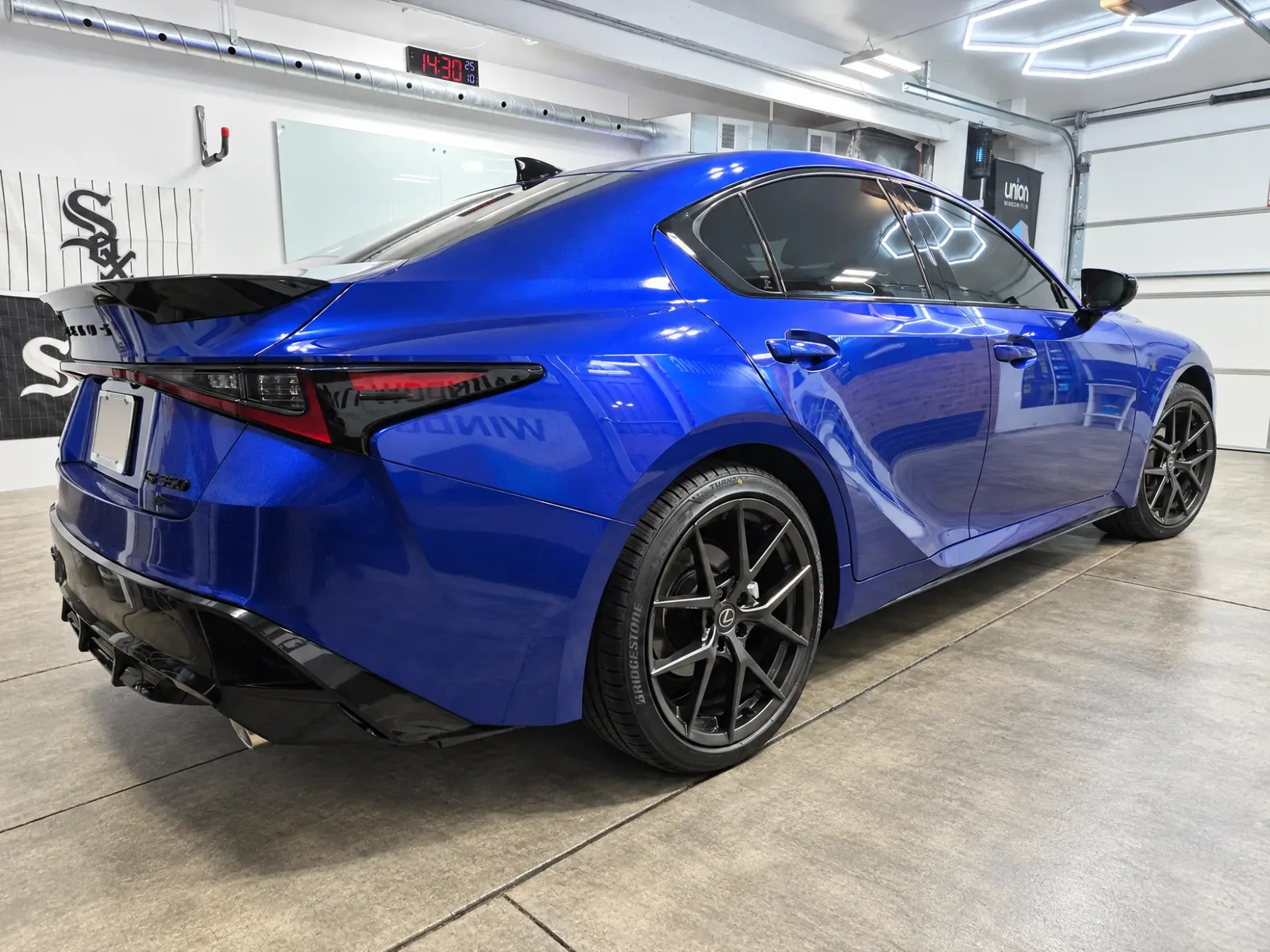 Blue Lexus IS with tinted windows, tinted by Beast Auto Tints